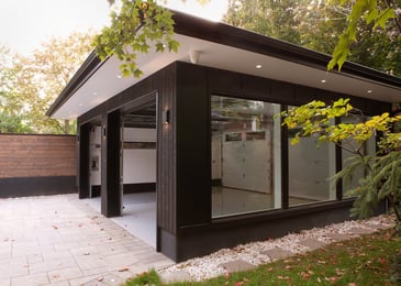 Custom garage exterior in Toronto with modern building material by SevernWoods