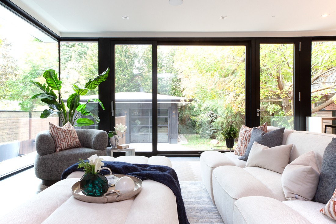 Luxury first floor custom home exterior with floor to ceiling windows in Rosedale, Toronto