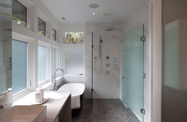 Primary bathroom with film windows and curbless shower & tub combo-1