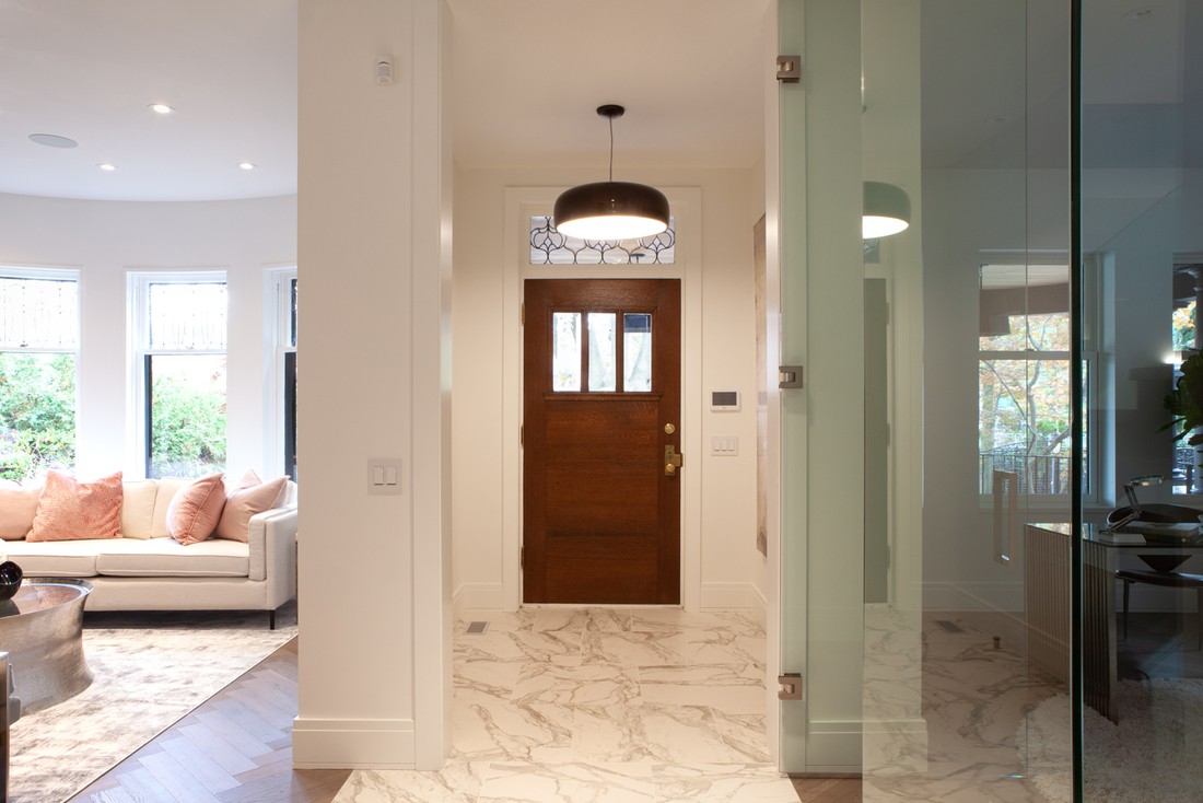 View of front door to Rosedale, Toronto luxury custom home with family room