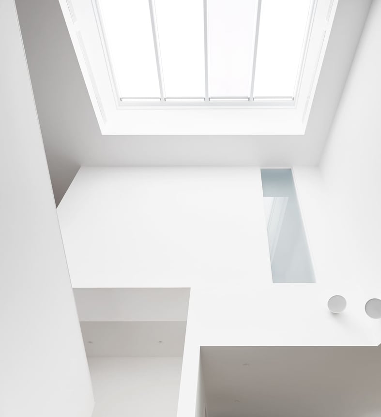 Example of Modern Architectural Design in Custom Home With Skylight and Minimalist Design
