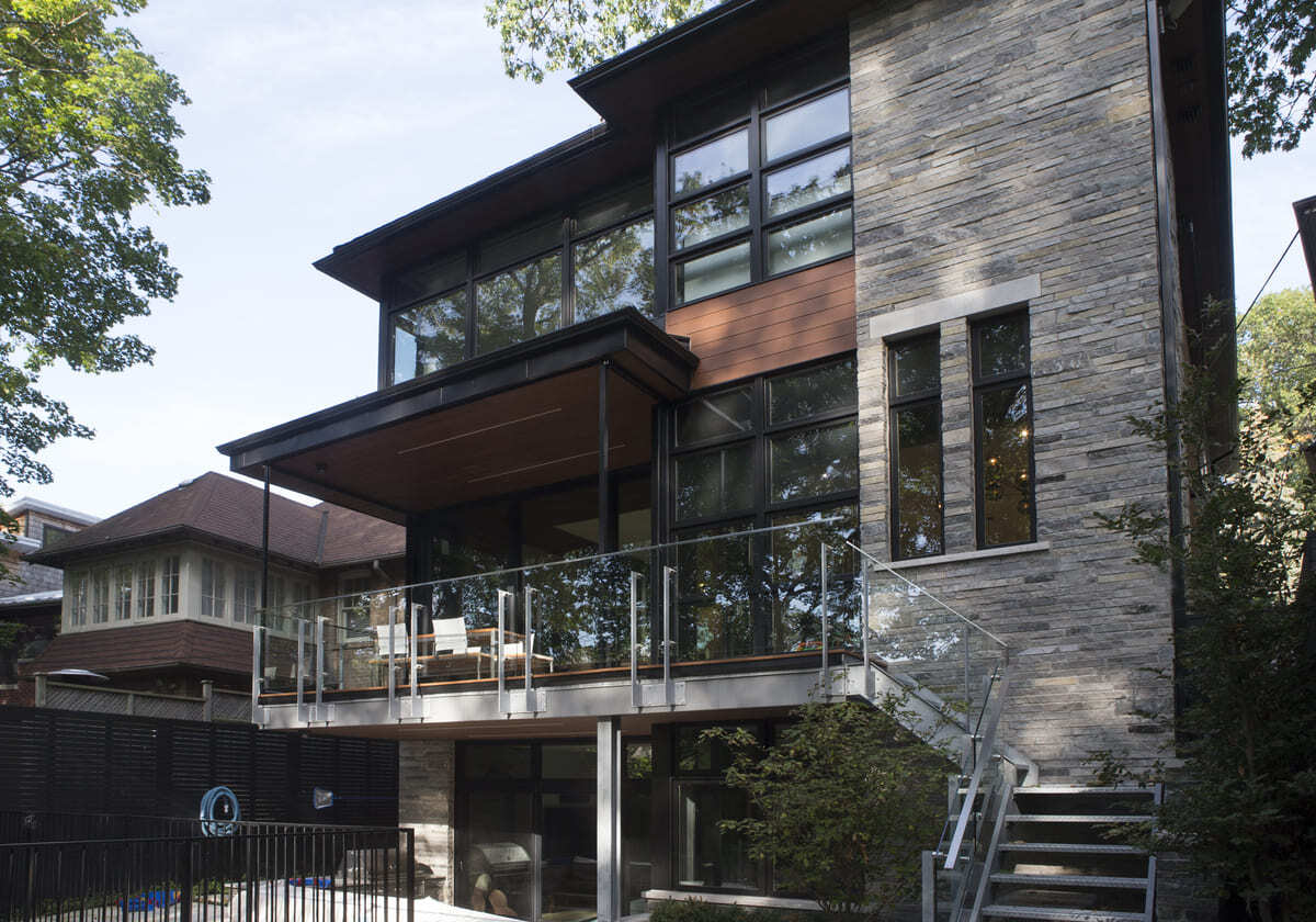 galvanized-steel-railings-on-raised-deck-with-glass-panelling