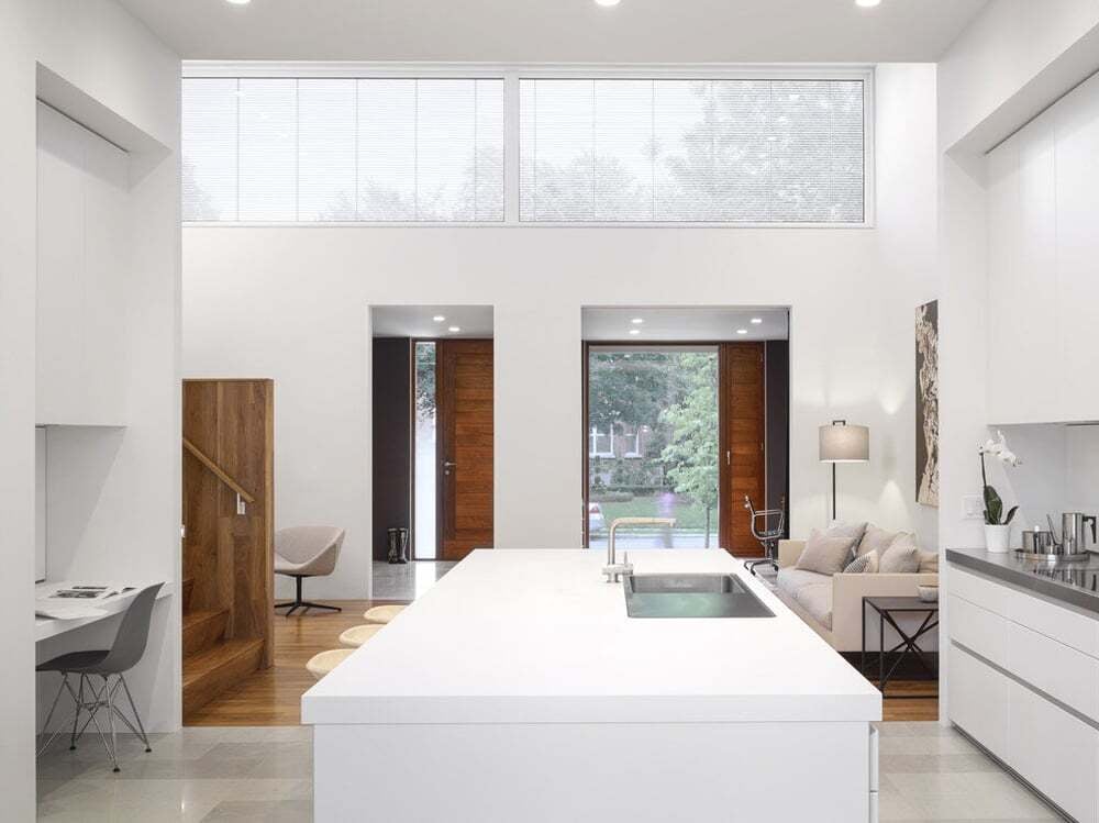 kitchen-island-open-plan-double-height-wood-doors-counterpoint-severnwoods-toronto