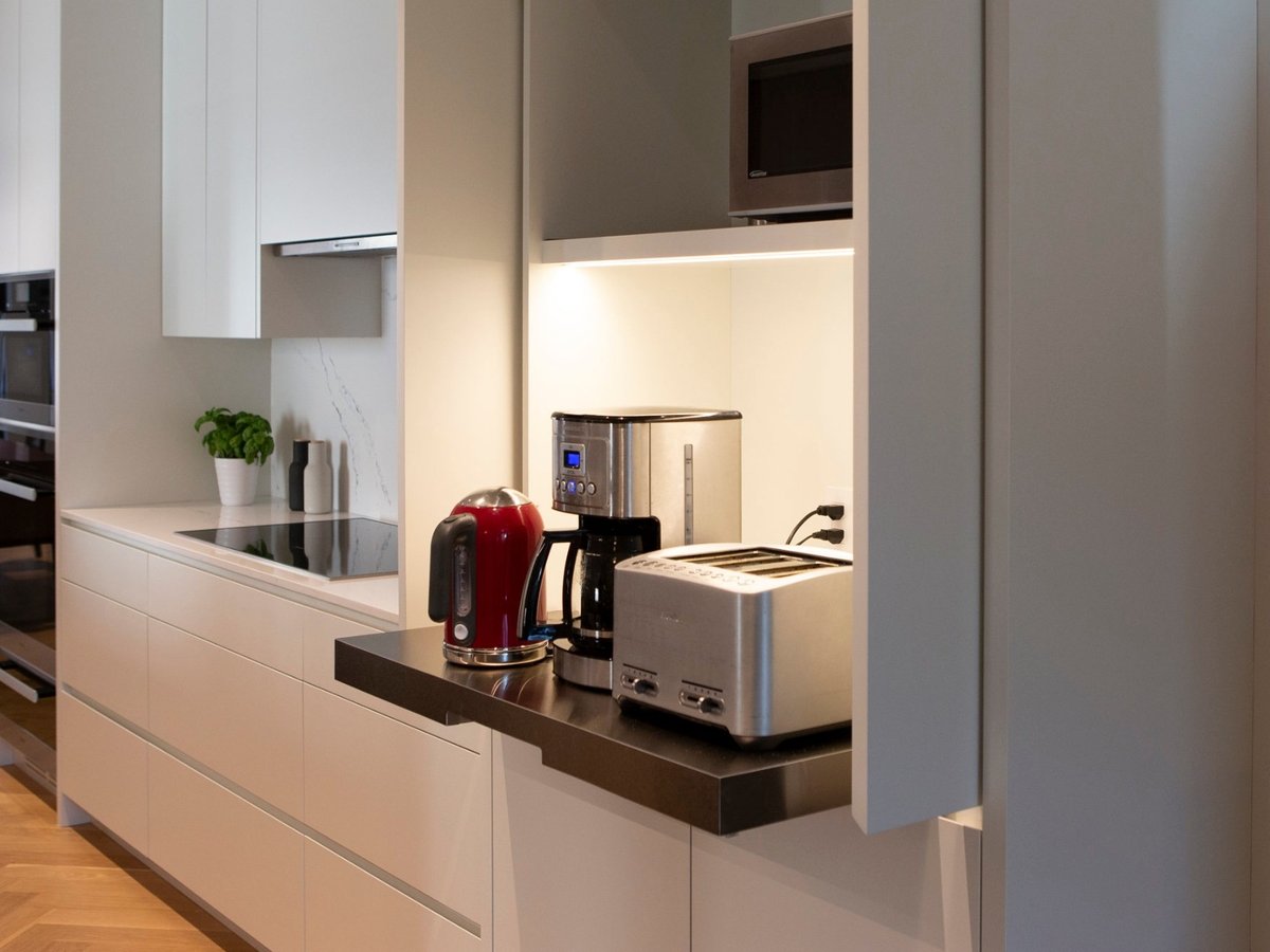 kitchen-hidden-appliance-garage-white-flat-panel-cabinets-playter-estates-severnwoods-toronto
