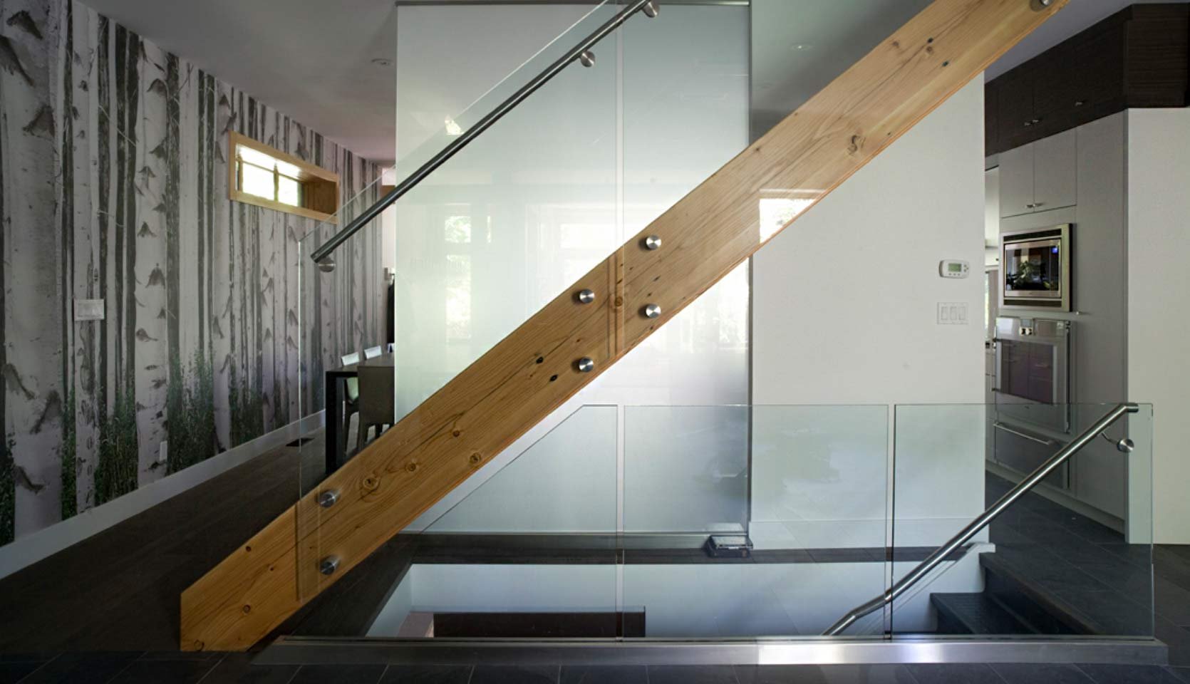 staircase-glass-panel-wood-newel-birch-wallpaper-annex-severnwoods-toronto