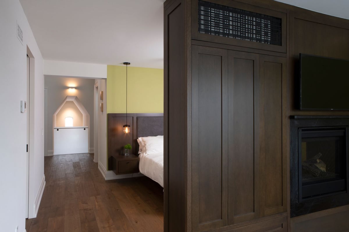 bedroom-fireplace-wood-panel-dividing-wall-leslieville-severnwoods-toronto