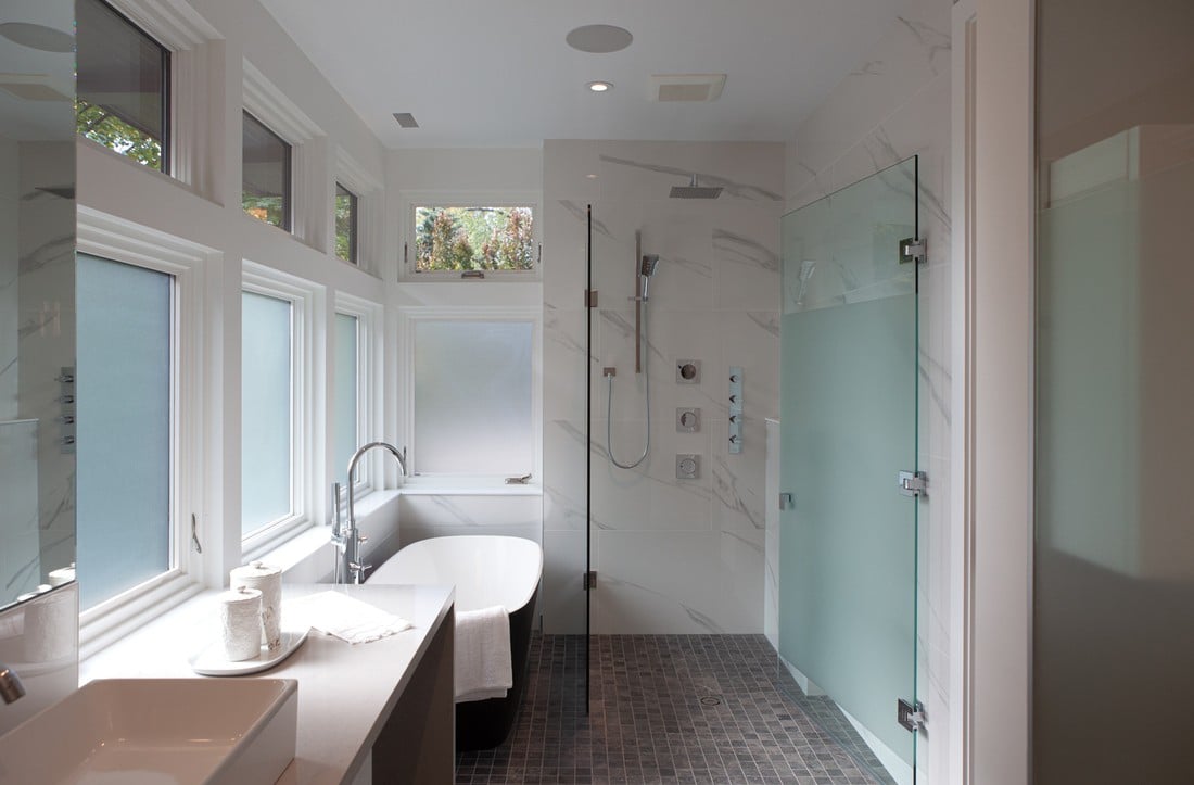 primary-bathroom-with-film-windows-and-curbless-shower-&-tub-combo-1
