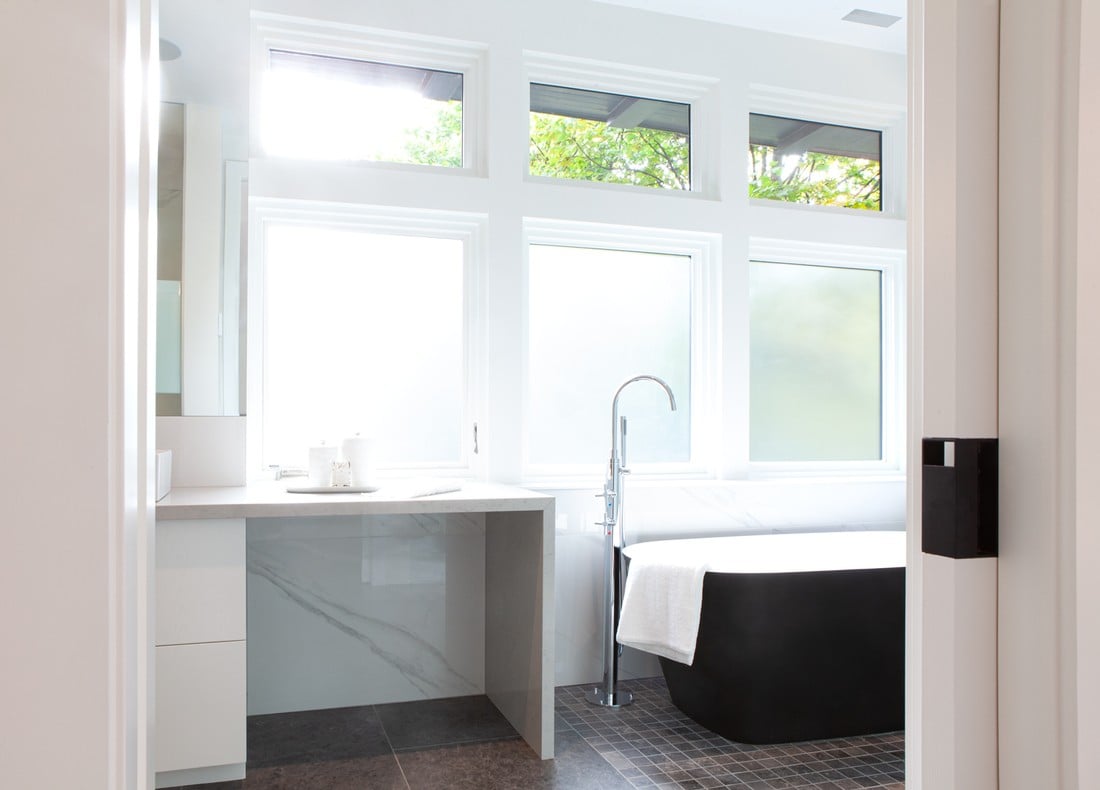 primary-bathroom-with-film-windows-and-freestanding-tub