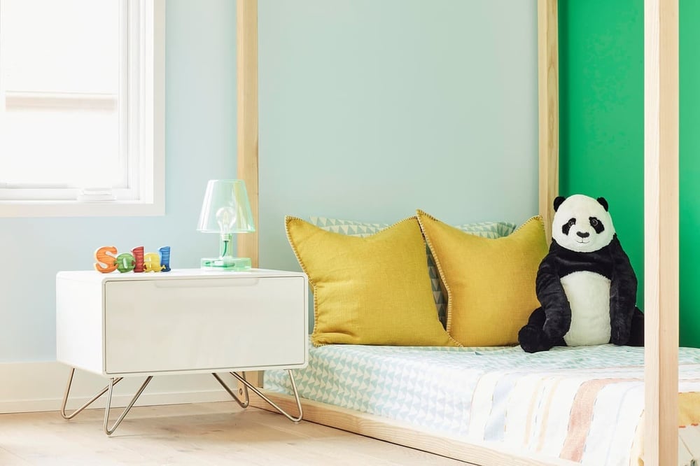 Kids' canopy floor bed in Toronto luxury home renovation by SevernWoods