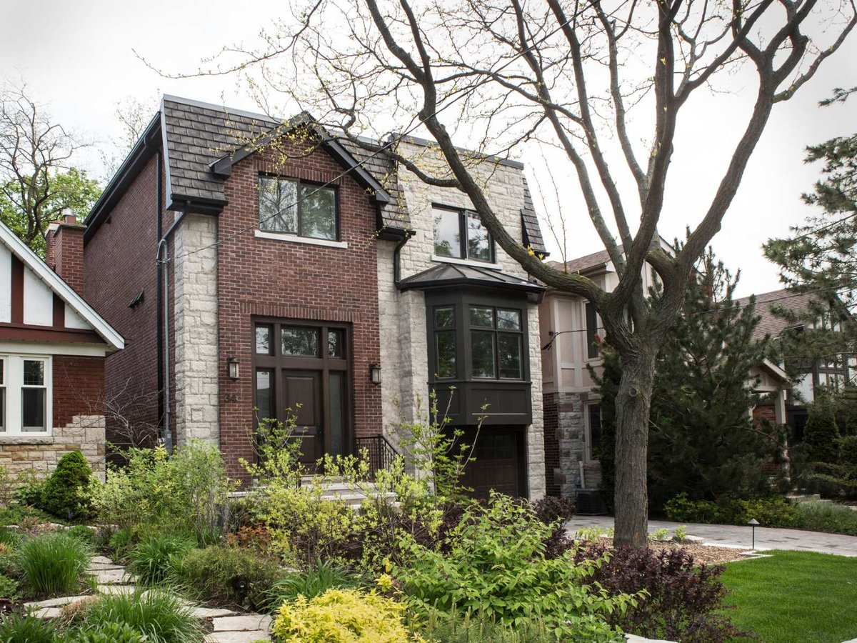 Leaside, Toronto exterior of custom home with brick and clay siding by SevernWoods
