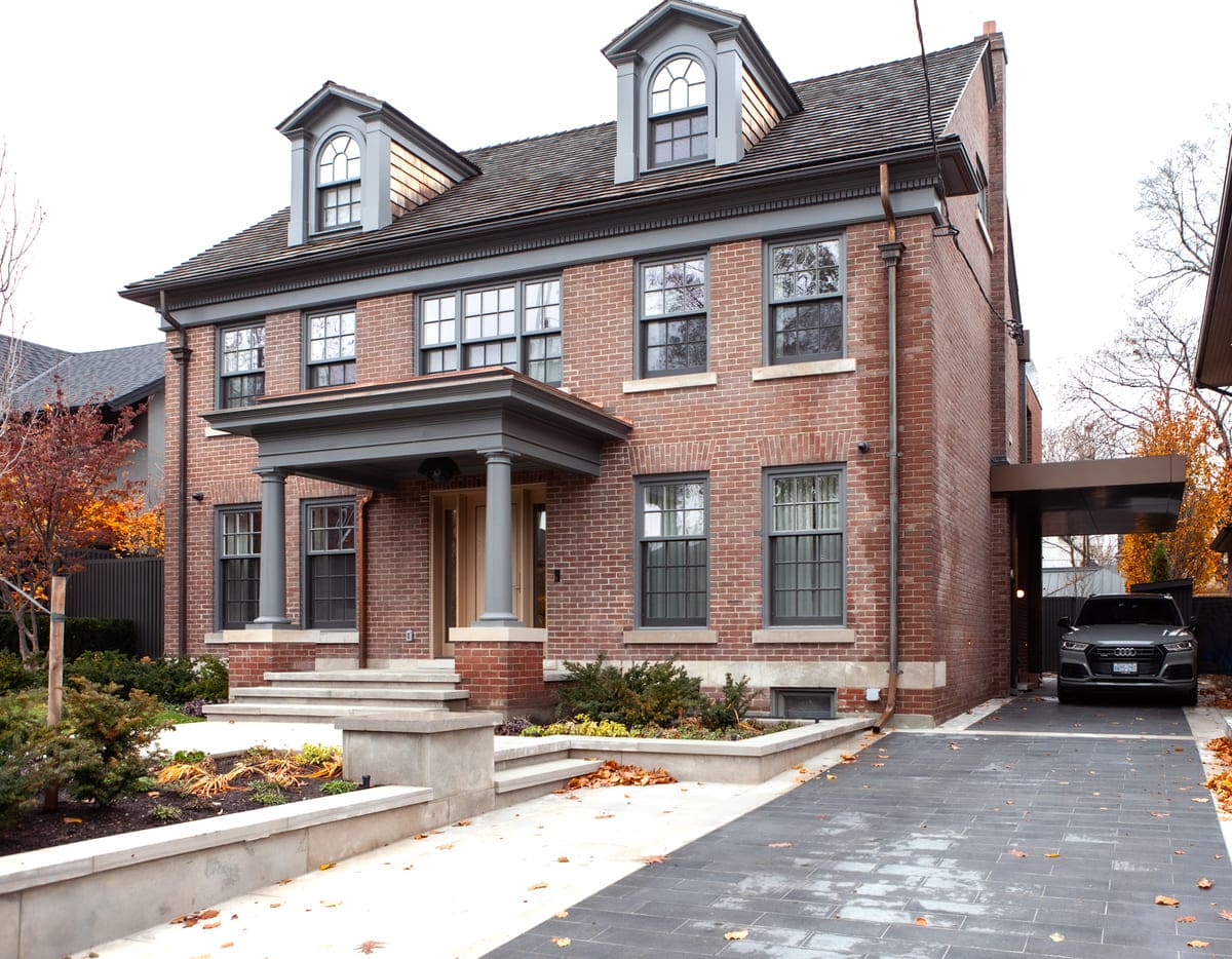 Luxury brick custom home exterior in Toronto by SevernWoods Fine Homes