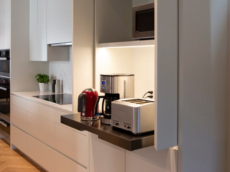 Luxury home renovation in Toronto with custom pull-out appliances in drawer