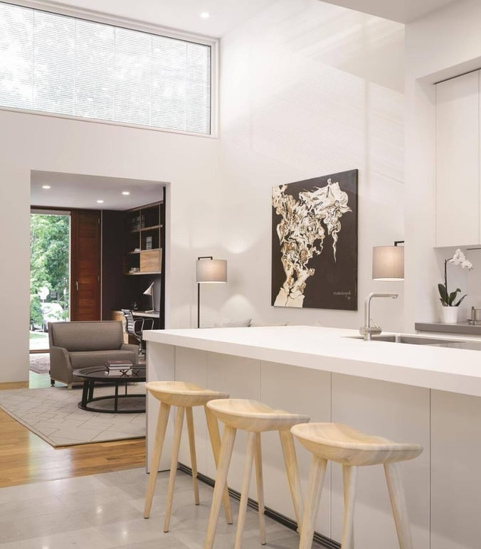 Minimalist style open-concept kitchen in Toronto custom home by SevernWoods with island