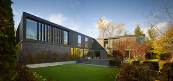 Modern custom home exterior in old Toronto by SevernWoods
