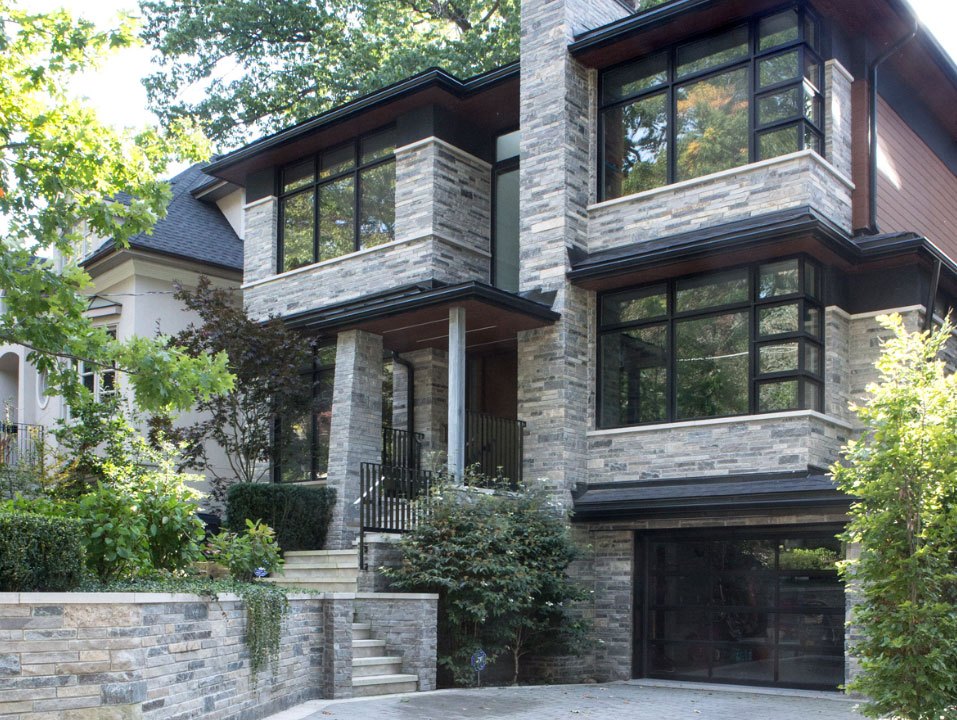 old toronto stone home exterior with lots of windows