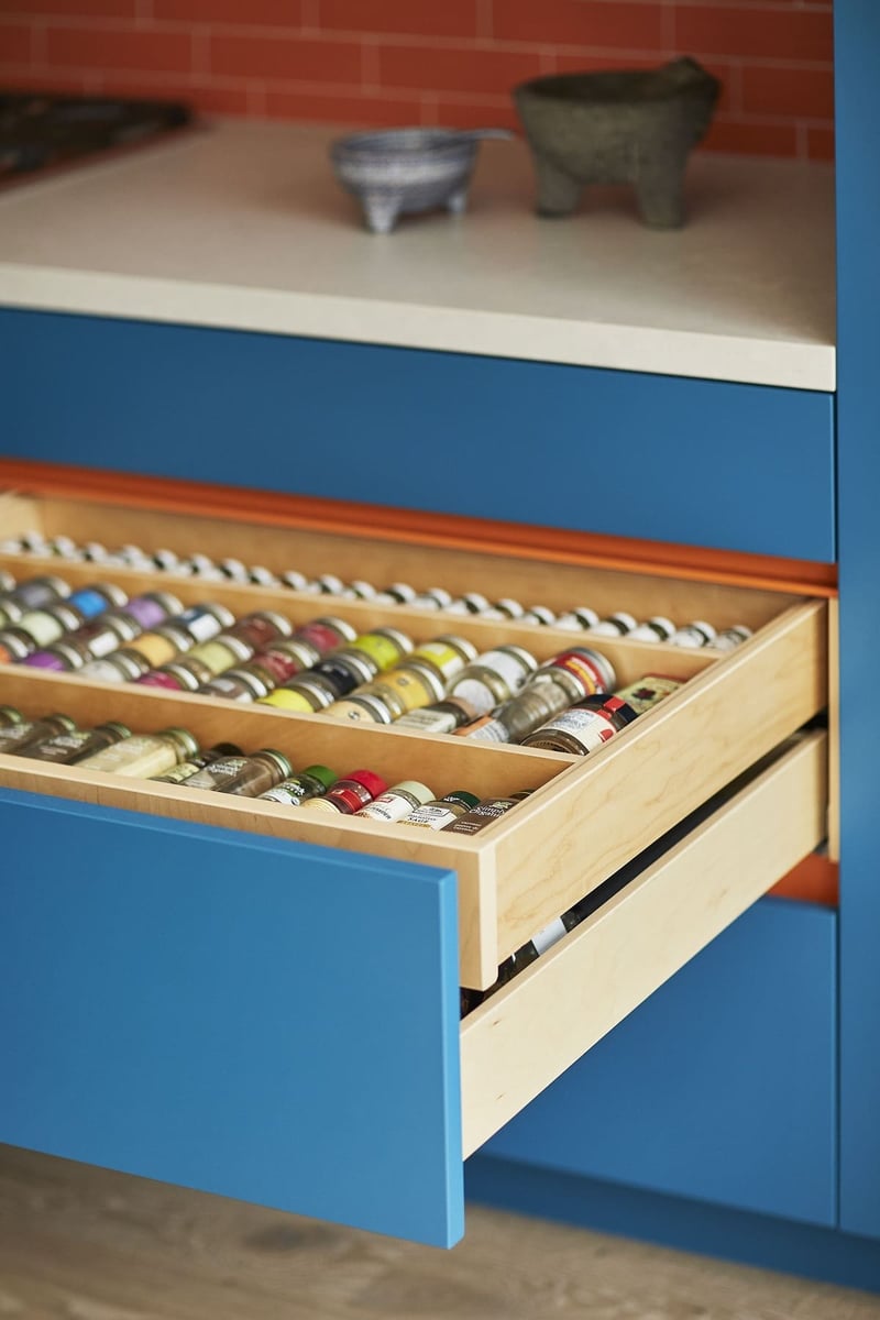 Spice drawer with blue flat panel finish by SevernWoods in Toronto home renovation