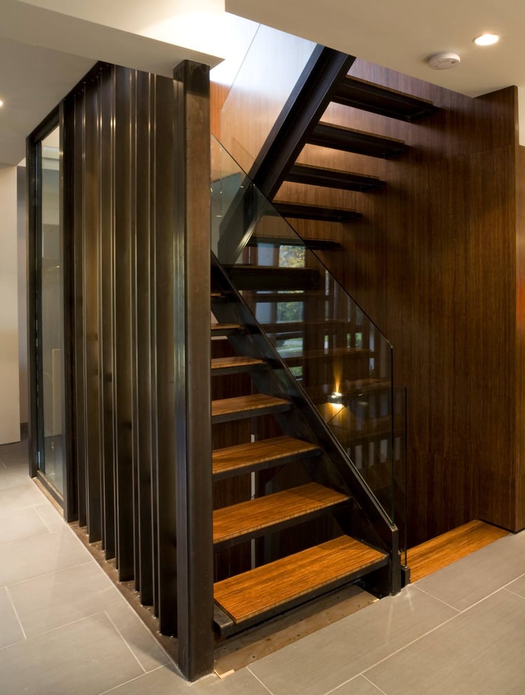 Steel custom staircase in Toronto whole home renovation by SevernWoods