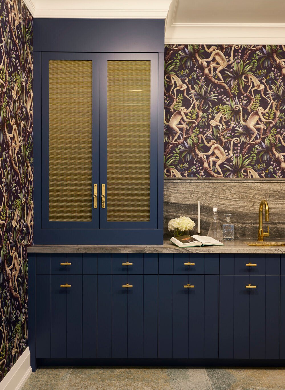 Blue and gold home bar with stone backsplash in SevernWoods Toronto custom home, photographed by Alex Lukey Photography