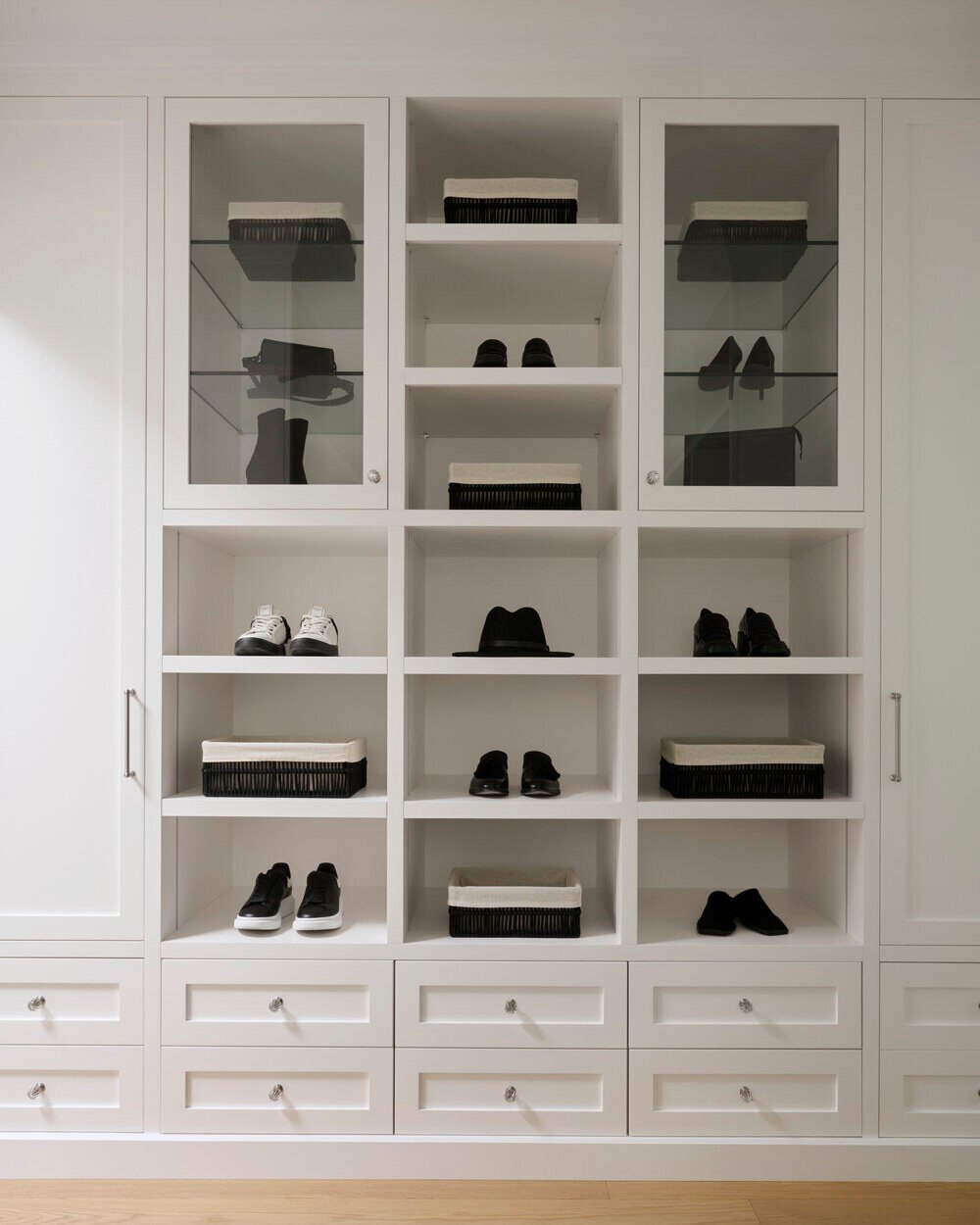 Organized custom closet with open shelving and glass doors in SevernWoods Toronto home, photographed by Alex Lukey Photography
