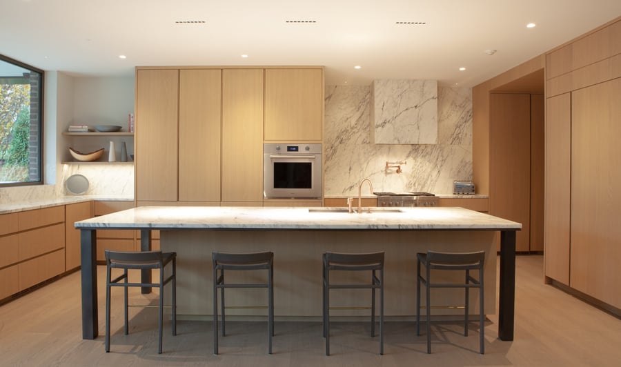 Luxury kitchen with oak cabinets and extended island in Toronto addition and renovation by SevernWoods Luxury kitchen with oak cabinets and extended island in Toronto addition and renovation by SevernWoods