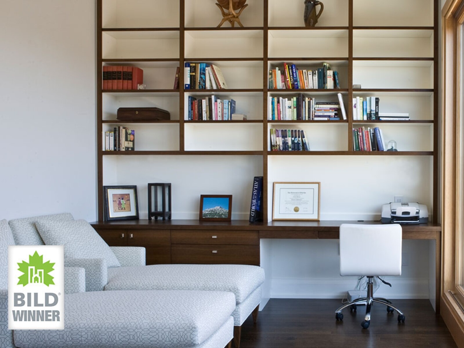 Little Italy, Toronto luxury home renovation with built-in book shelf by SevernWoods