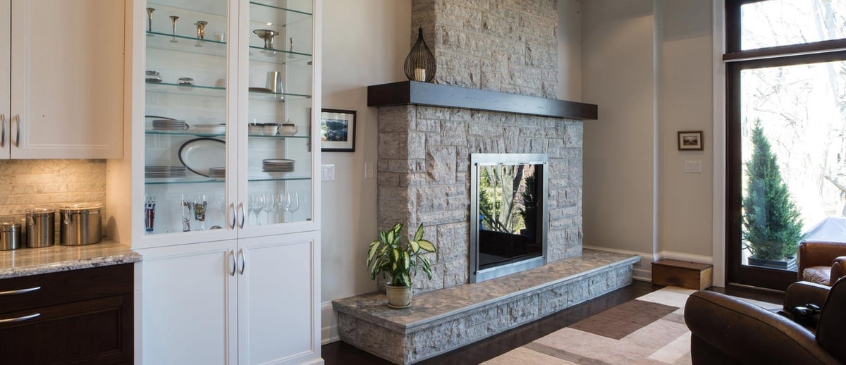 custom-Rumford-fireplace-clad-with-a-blue-veined-Ontario-limestone