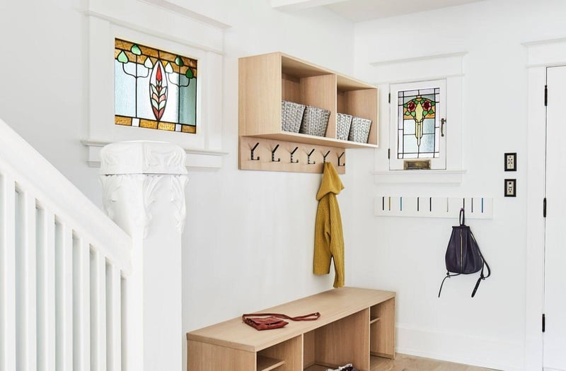 entryway-of-toronto-home-with-traditional-stained-glass-window-slot-and-custom-shelving-and-hooks