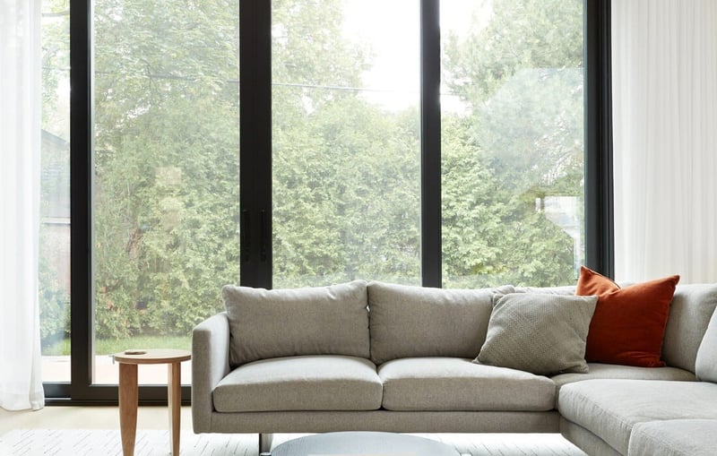 luxury-living-room-area-with-floor-to-ceiling-windows