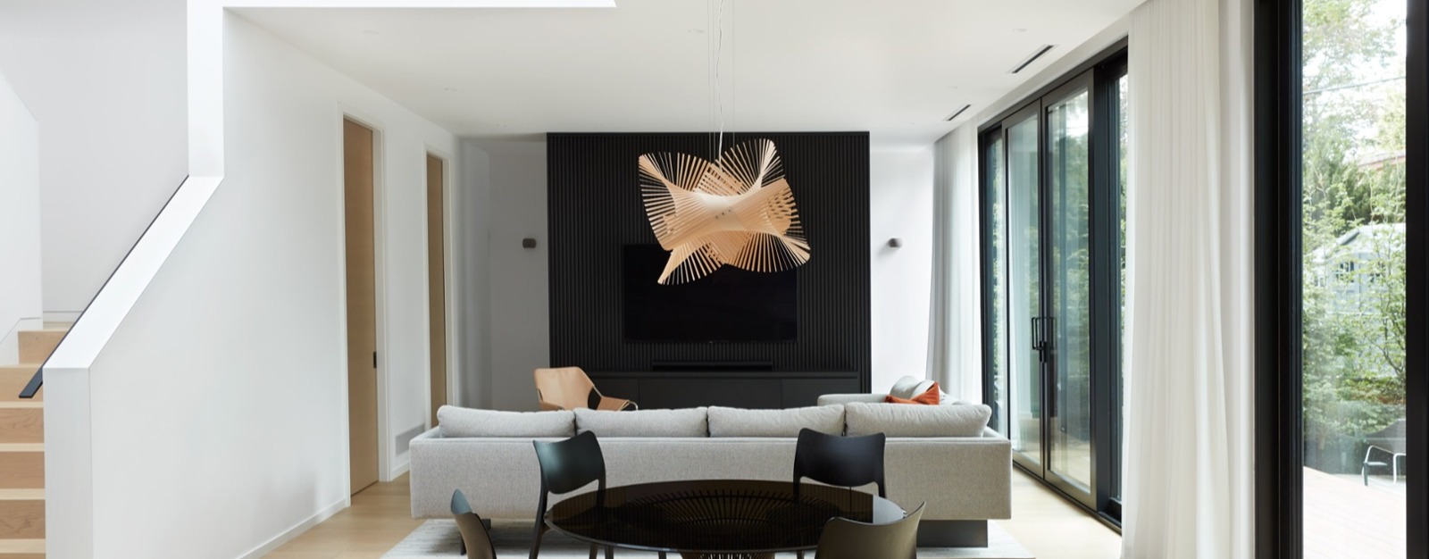 minimal modern living room with circular pendant lighting-2-1