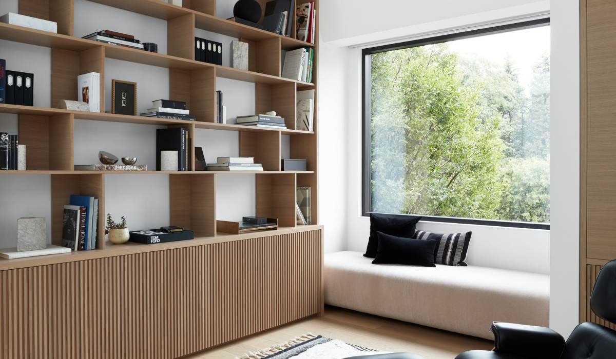 modern Japandi style custom shelving near window with seating