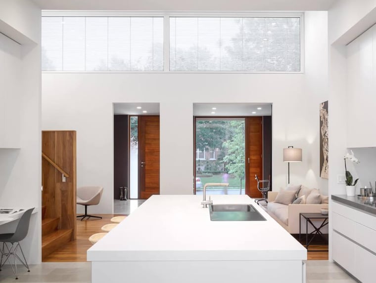 Open-concept white contemporary whole home renovation
