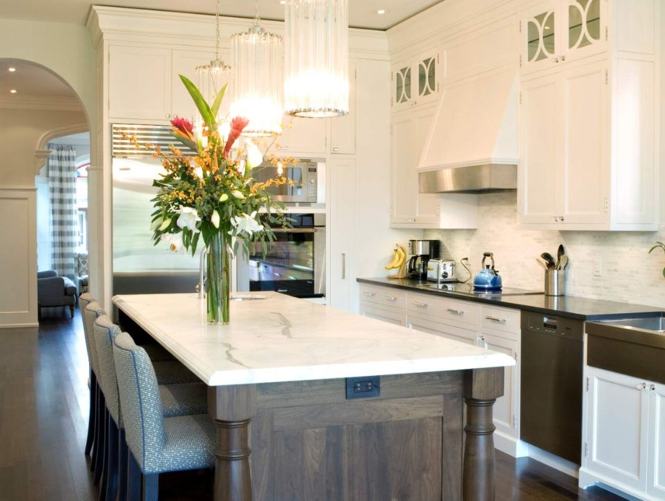 Whole home renovation kitchen with three pendant lights above island
