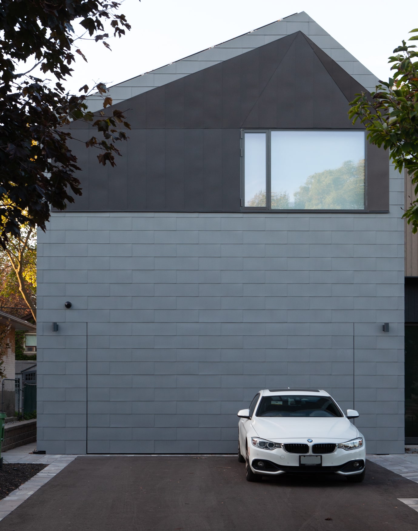 zinc cladding hidden garage flush on toronto luxury modern home