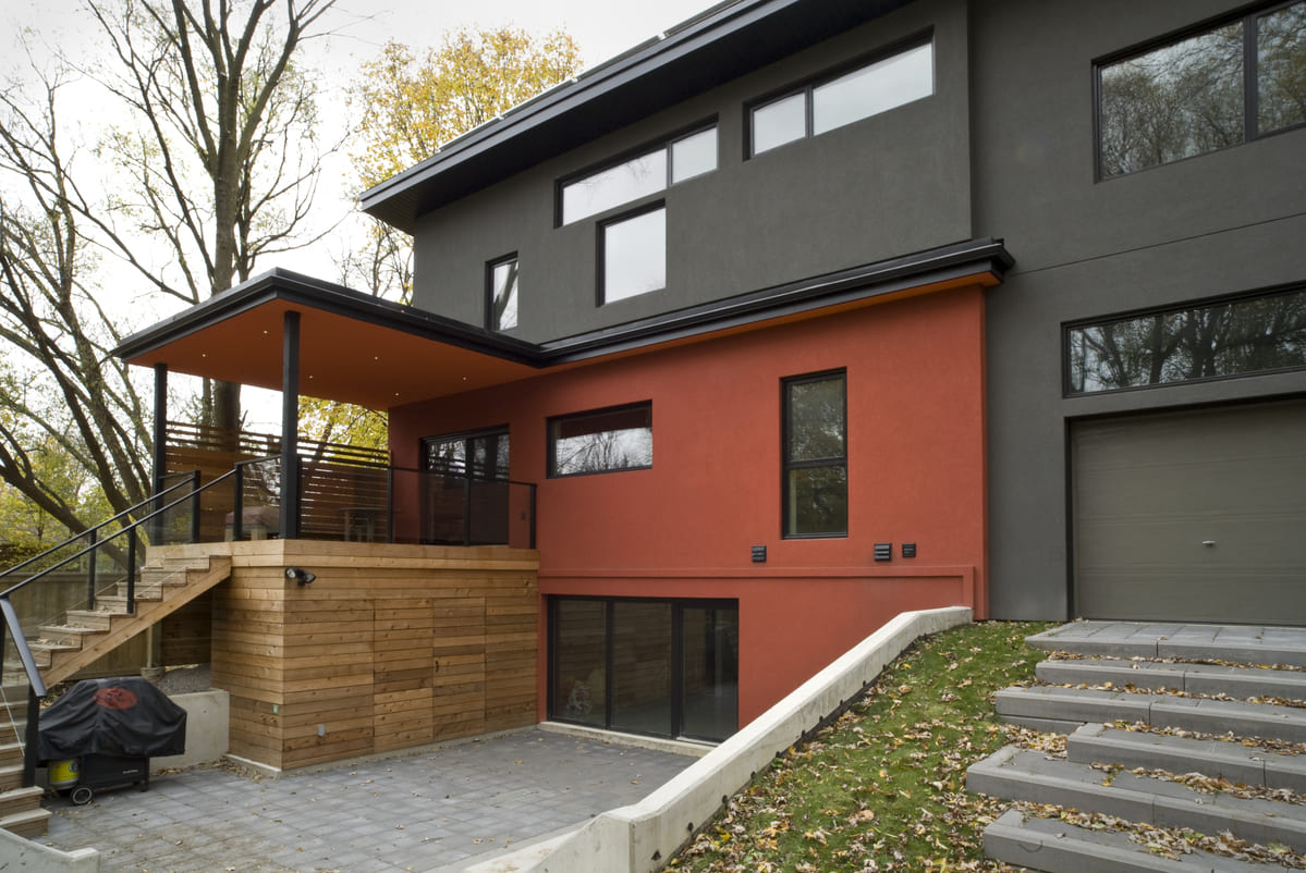 Exterior of elevated cedar wood deck above utility room in Toronto luxury home renovation