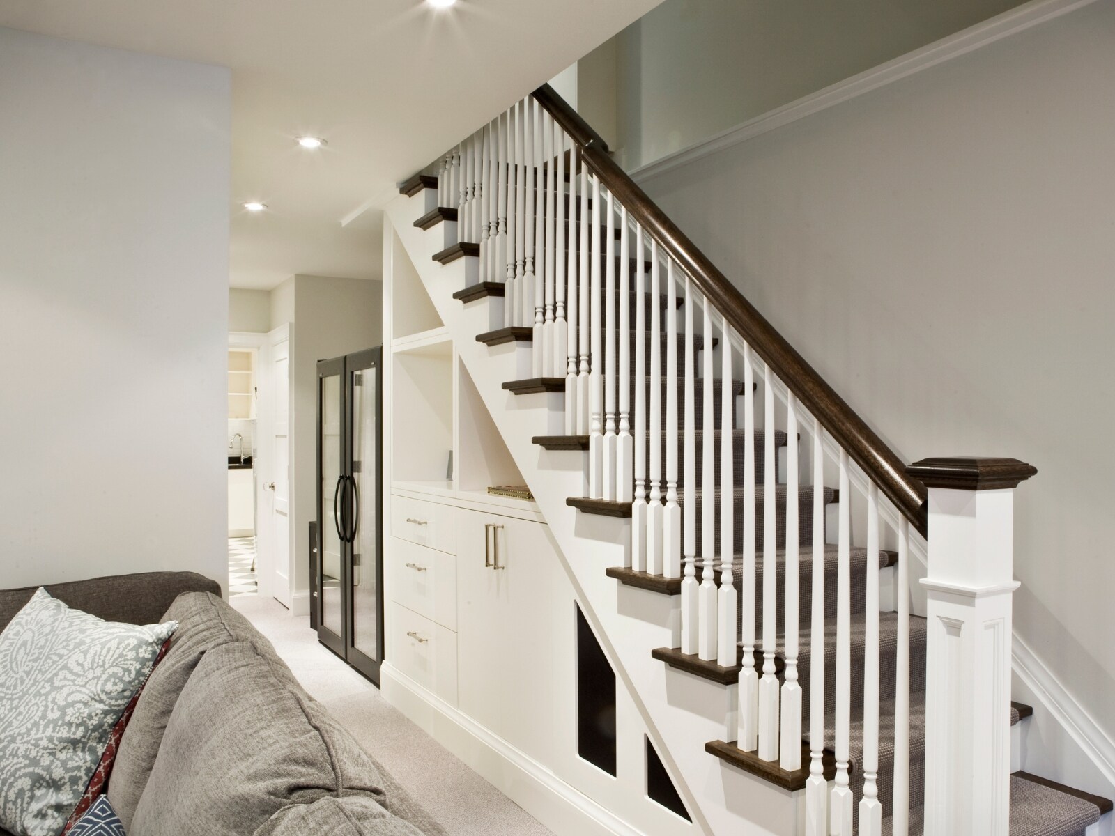 staircase-built-in-storage-under-stairs-dark-wood-treads-little-italy-severnwoods-toronto