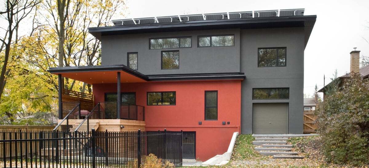 exterior-rear-red-grey-stucco-cedar-deck-north-york-severnwoods-toronto