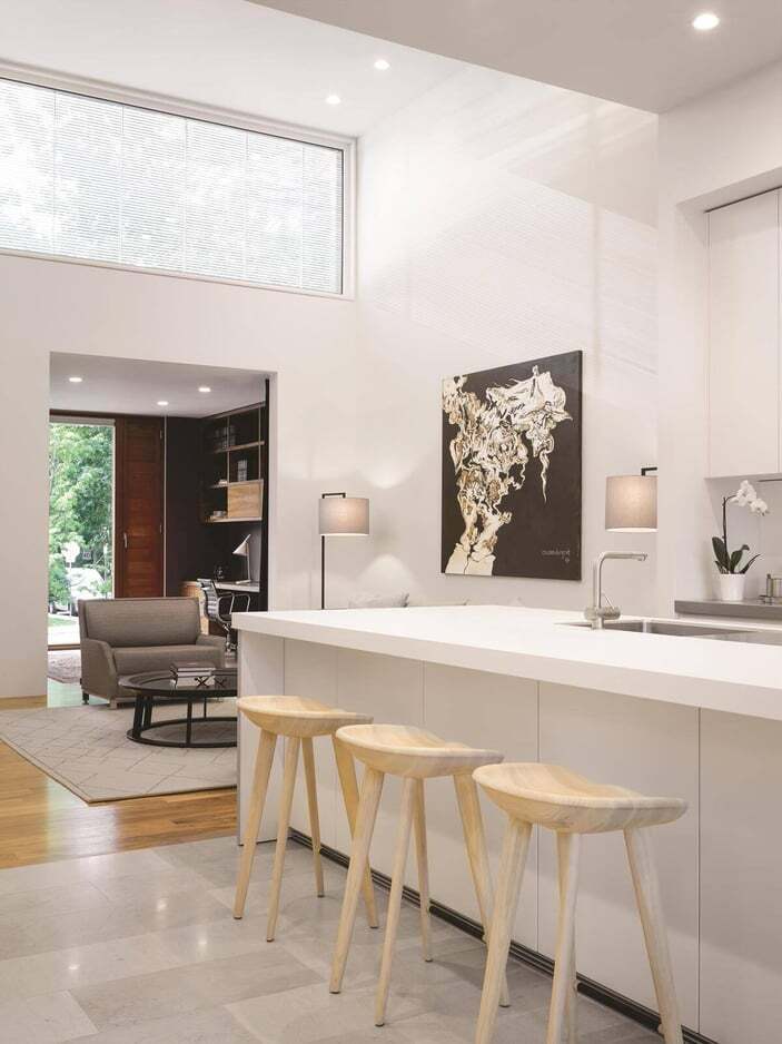 kitchen-island-bar-stools-open-to-living-room-counterpoint-severnwoods-toronto