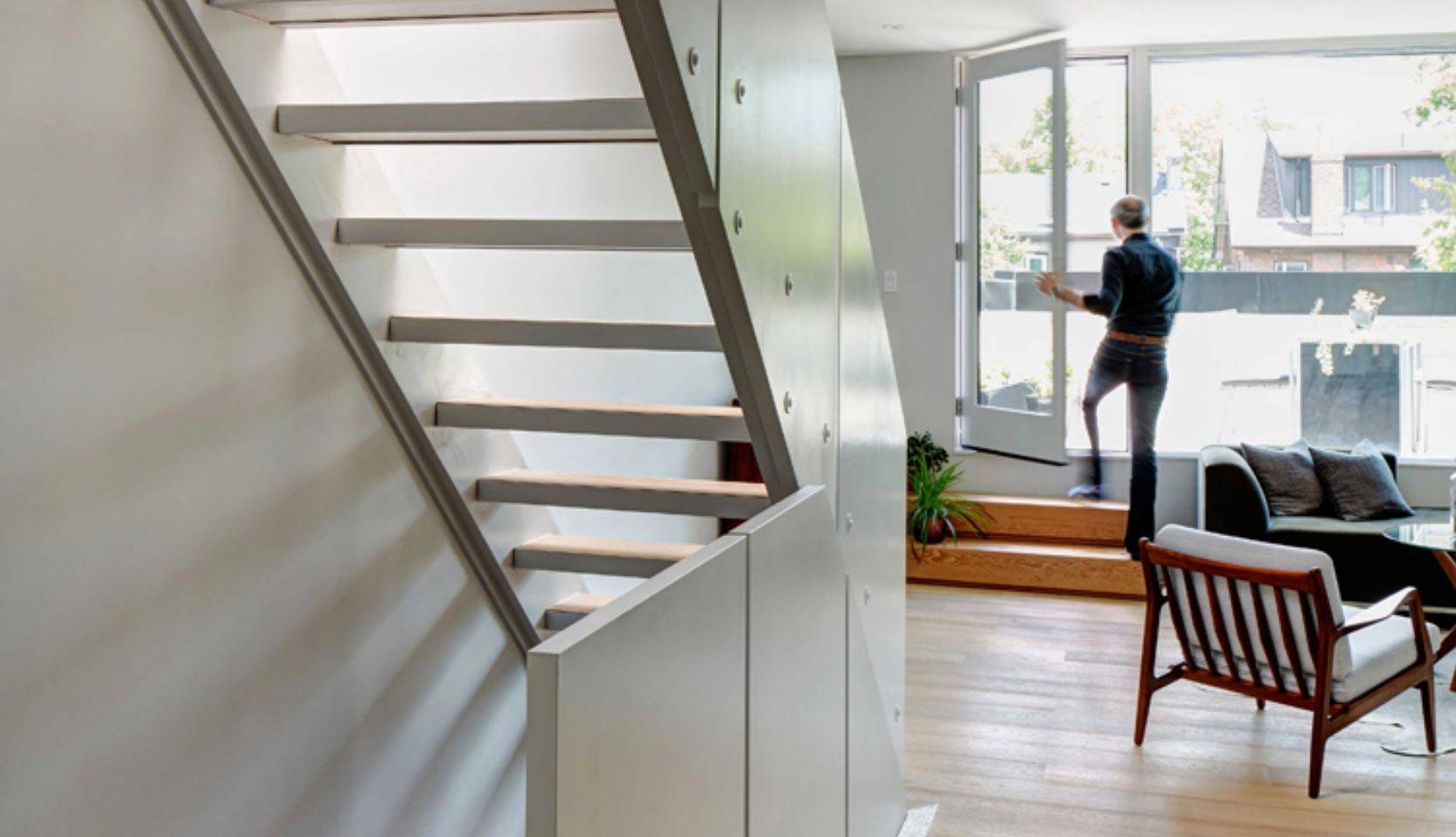 steel-open-riser-staircase-living-room-view-leslieville-severnwoods-toronto