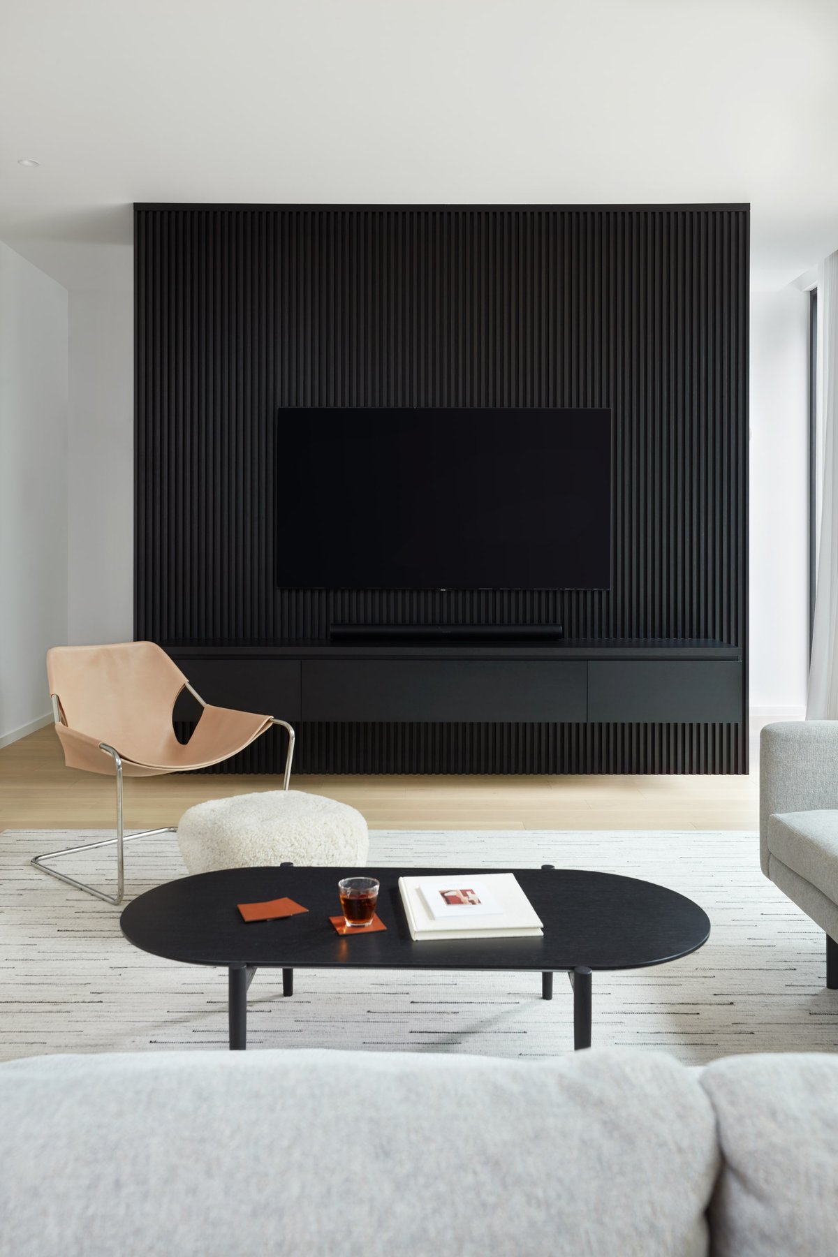 custom-modern-black-fireplace-against-wall-in-toronto-custom-home