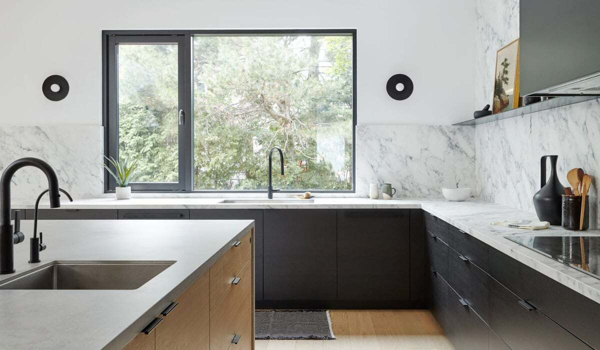 japandi-style-kitchen-with-marble-slab-backsplash-and-window