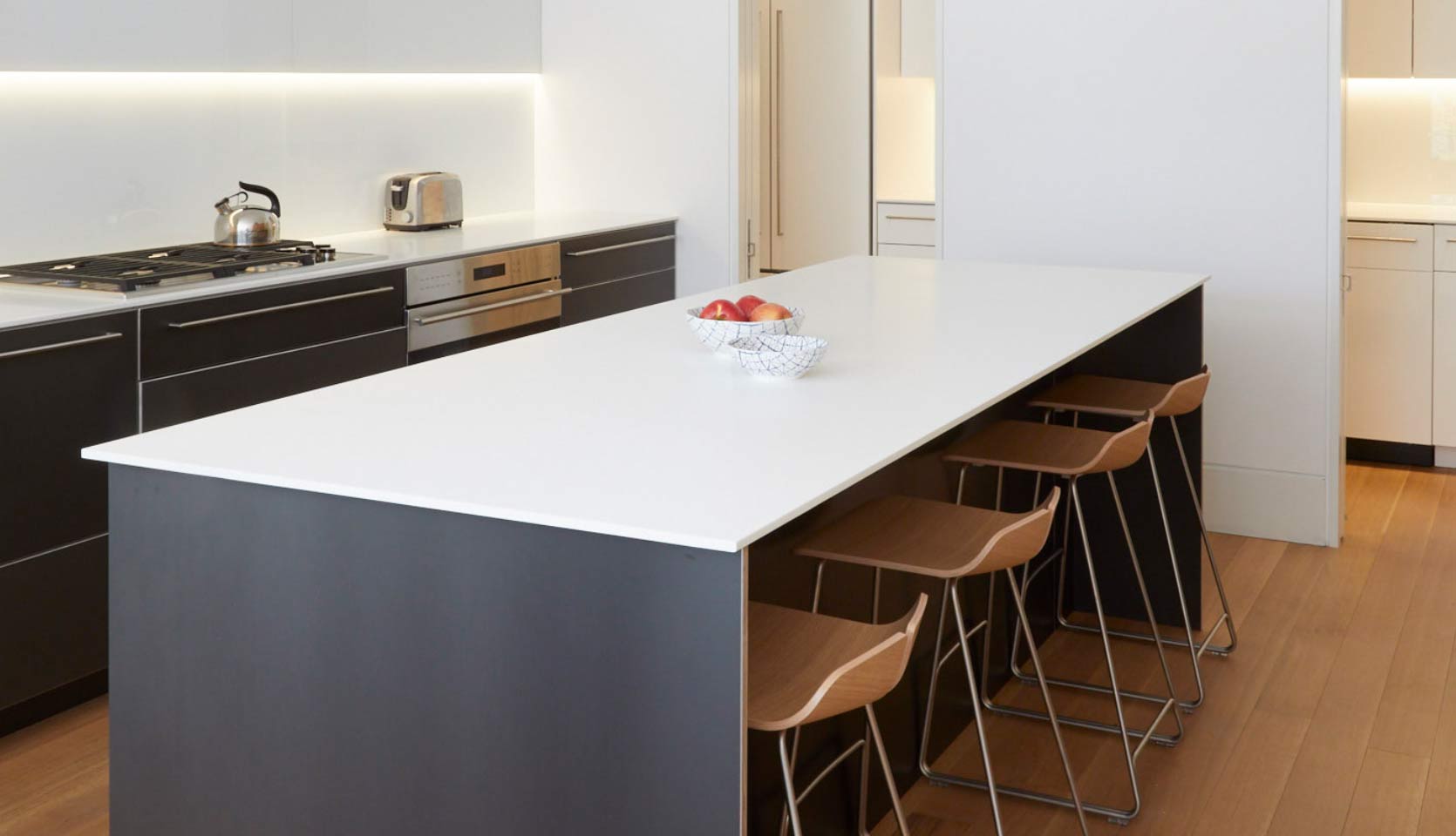 kitchen-white-quartz-island-dark-cabinets-wood-stools-moore-park-severnwoods-toronto