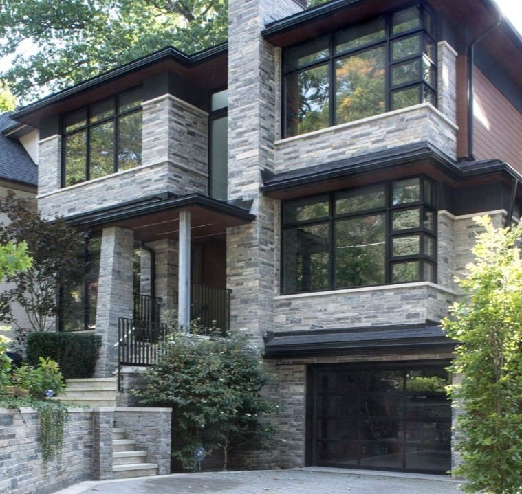 old toronto stone home exterior with lots of windows