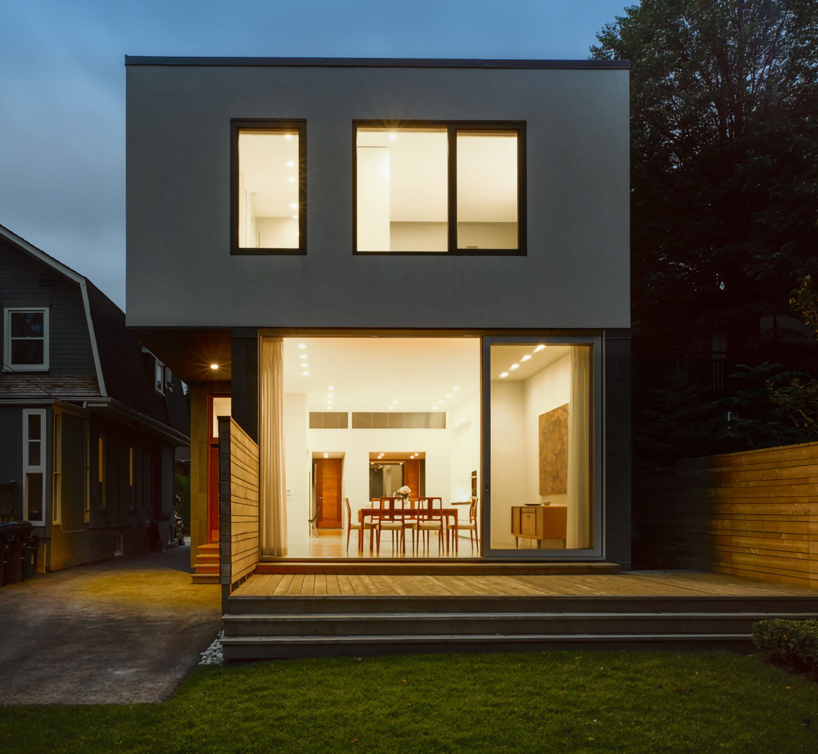 Back Exterior of Custom Home with Back Deck and Full Windows