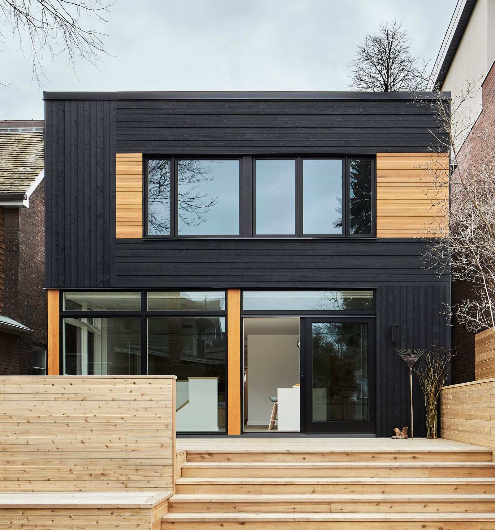 modern black home addition in toronto exterior backyard