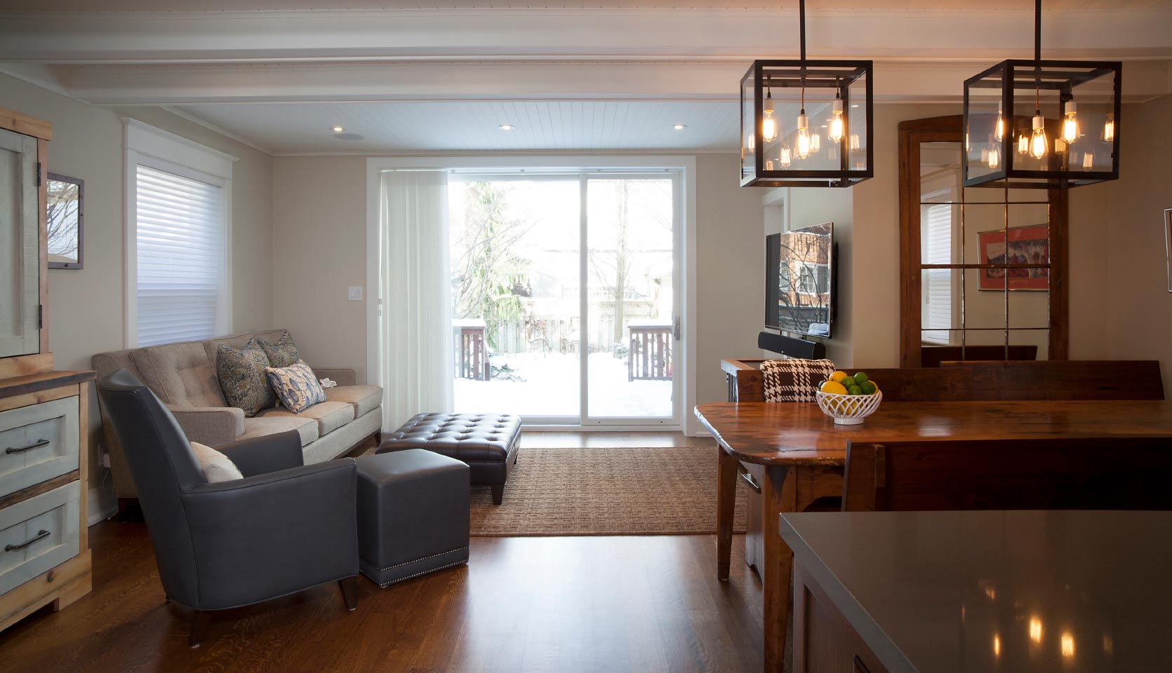 Dining and family room area in open-concept main floor space