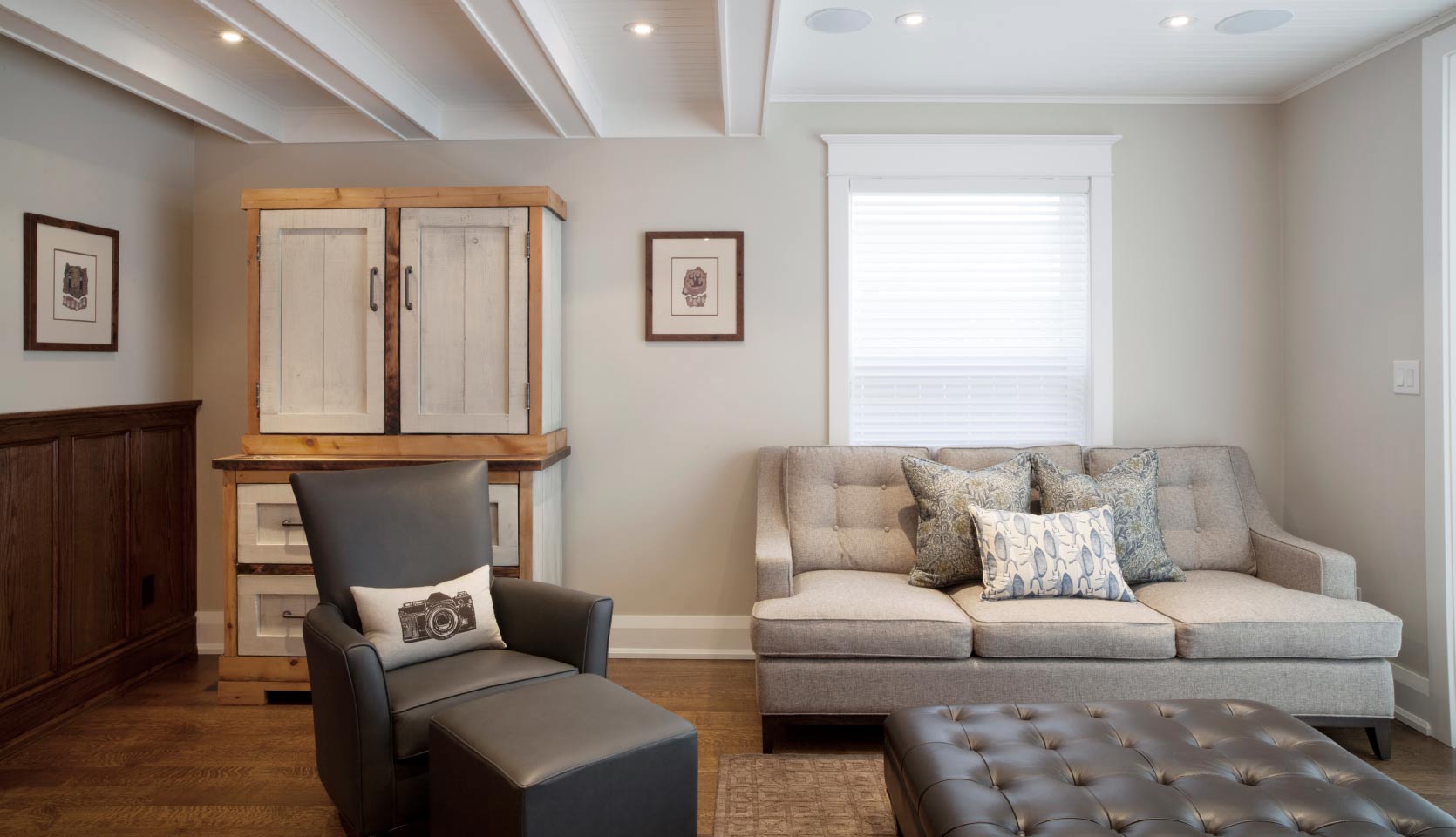 Family room renovation with ceiling beams and recessed lighting