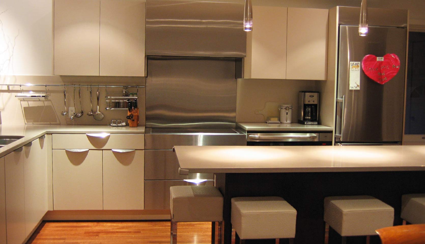 Kitchen Renovation with Contemporary Cabinet Pulls and Island with Seating